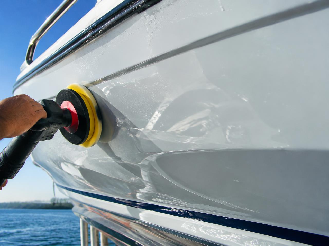 Polishing a glossy white boat hull